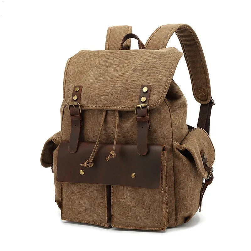 Retro-style army green canvas backpack with antique bronze hardware, shown closed.