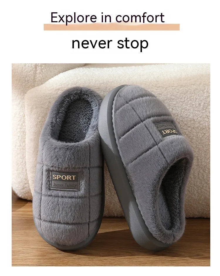 Men's grey and brown plaid rabbit hair slippers with thick wool lining and a flat EVA sole.
