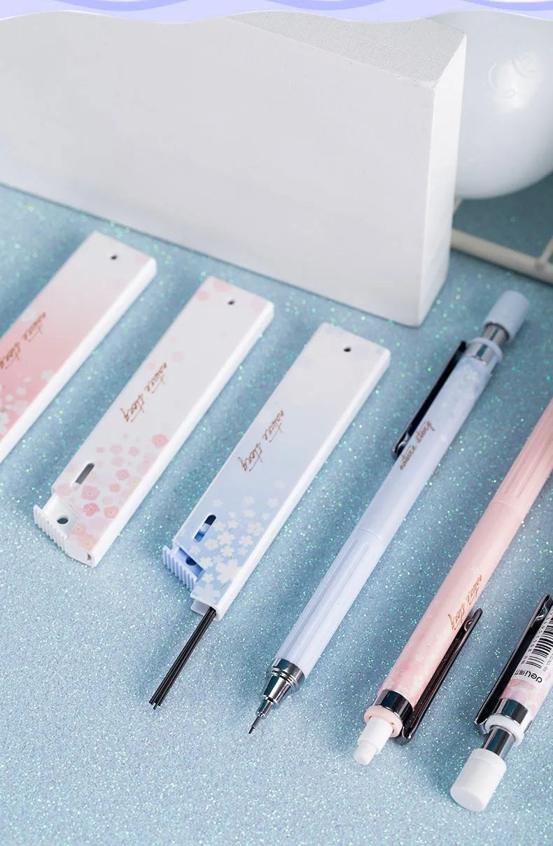 Three automatic pencils with cartoon Sakura law design and HB refill boxes