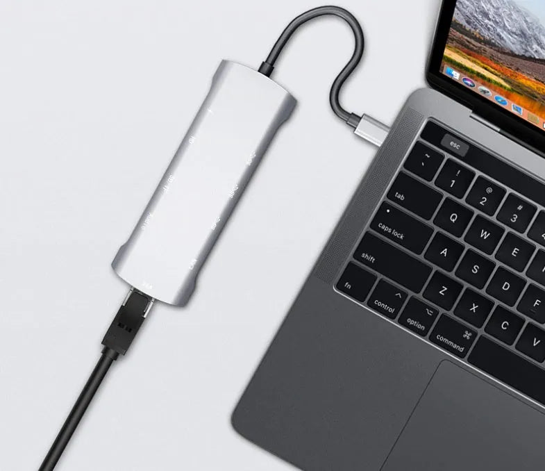 Grey USB-C docking station with HDMI, VGA, USB 3.0 ports and 14cm cable