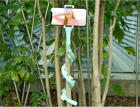 Lazy Bracket flexible mobile phone holder with suction cup mount extended to 62cm length showing 360° rotation mechanism