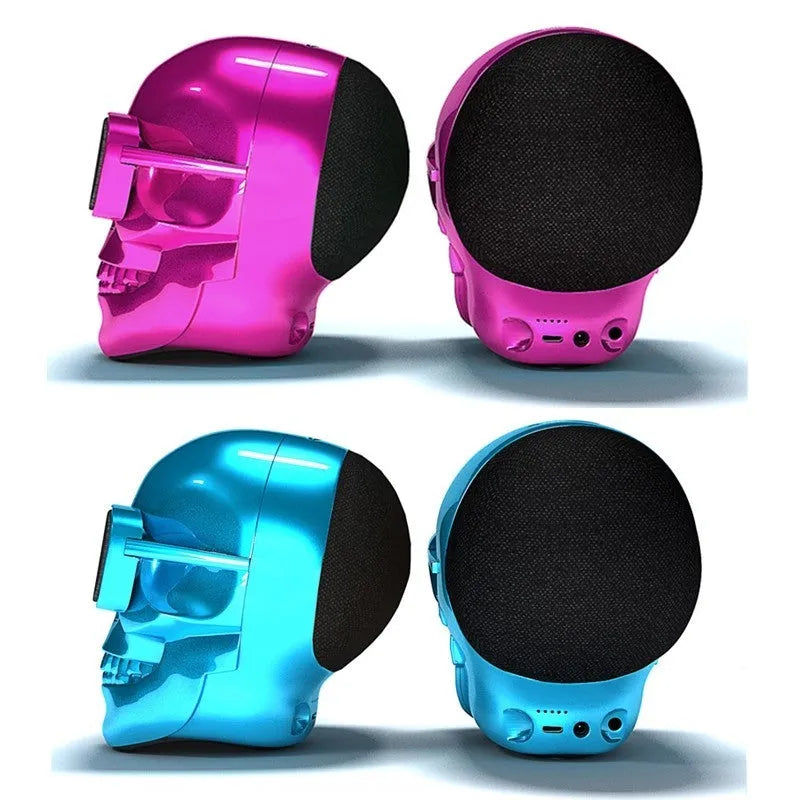 Skull-themed portable wireless Bluetooth speaker in choice of six colours on a table.
