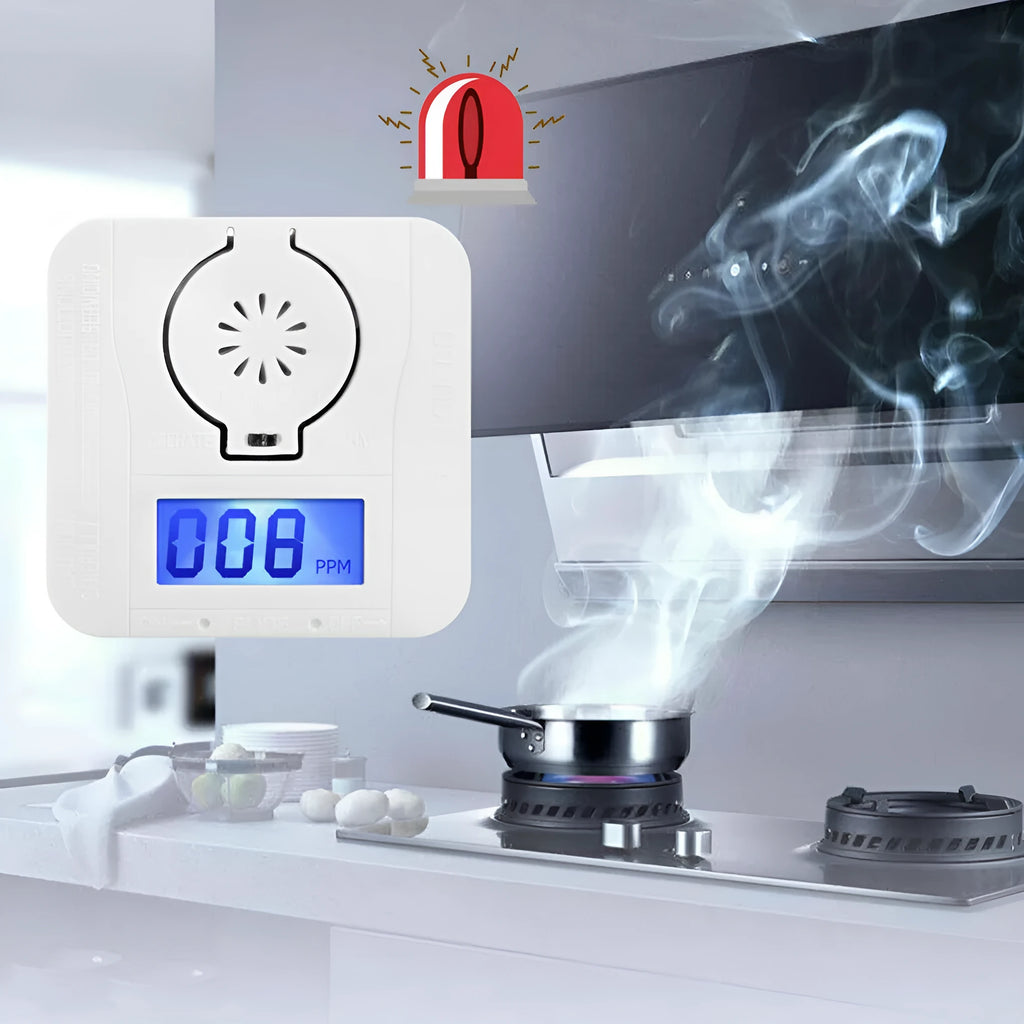 White wireless carbon monoxide alarm mounted on a wall for home safety.