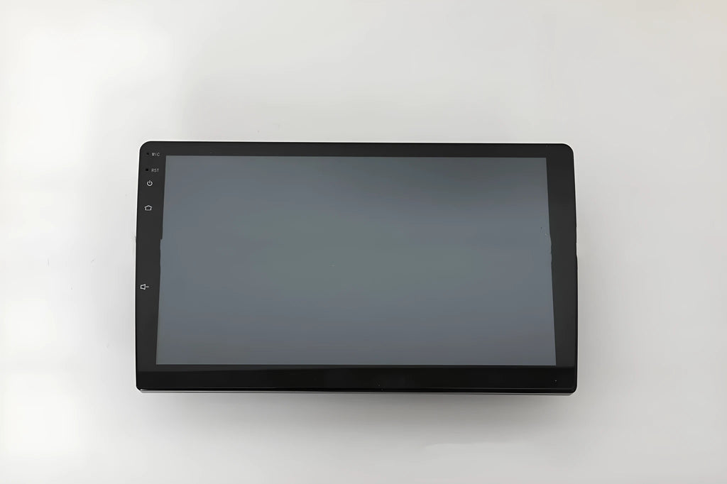 10.1 inch Android universal car machine with trapezoid panel and connection ports visible