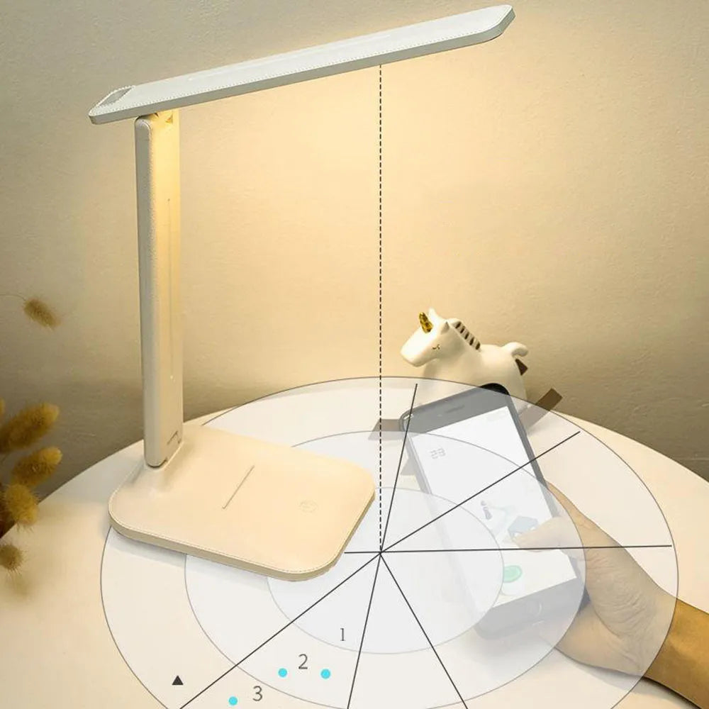 White plastic bedside lamp with touch dimming controls for children's bedrooms