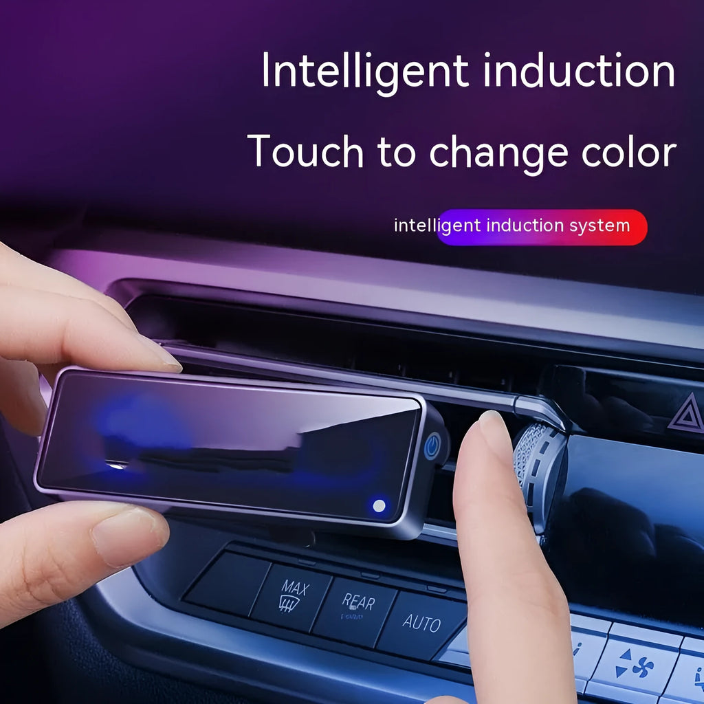 Black car air vent ambient light and perfume deodorizer with USB cable.