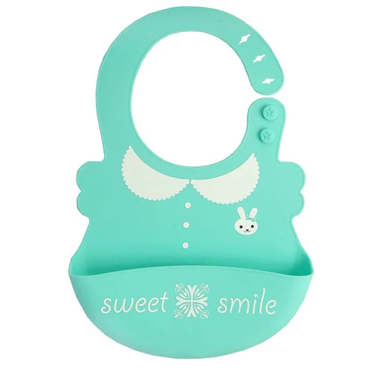 Waterproof silicone baby feeding bib with deep pocket in multiple colours, 28x21cm, on a white background
