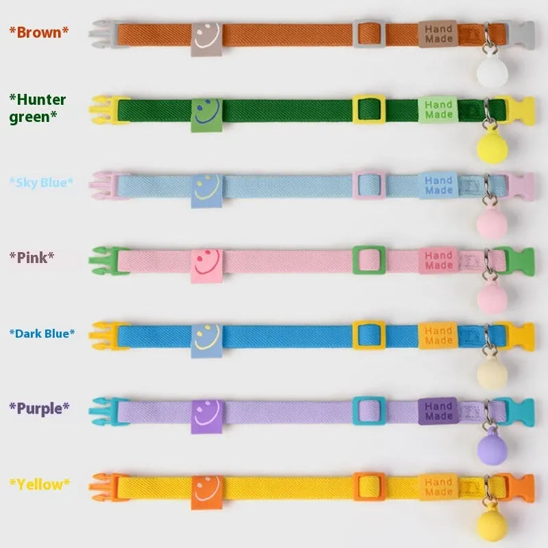 A small dog collar made from high elasticity polyester fabric in a choice of seven colours, adjustable between 22 and 32 cm.