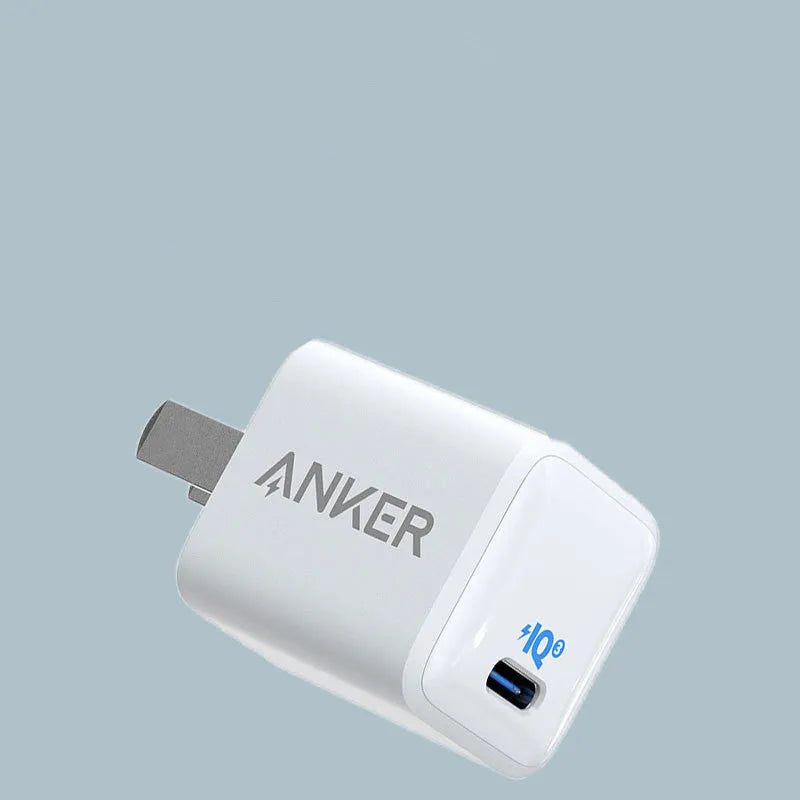 White 18W USB travel charger for mobile phones with 5V output and 600mA charging current