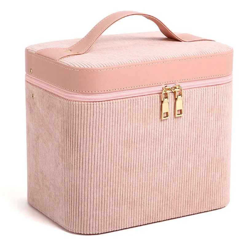 Corduroy cosmetic storage case in a choice of colours, showing large capacity interior with lining.