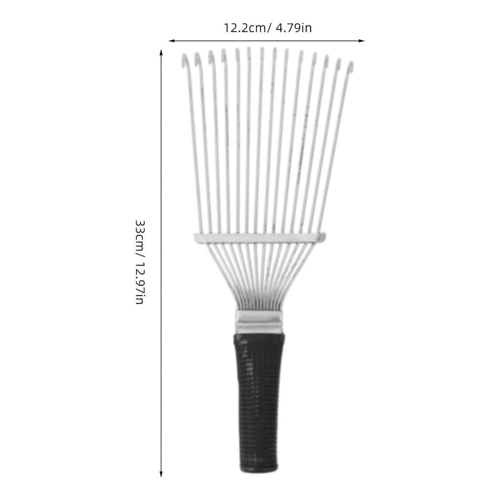 Stainless steel dematting brush rake comb for dog and horse grooming on a table.