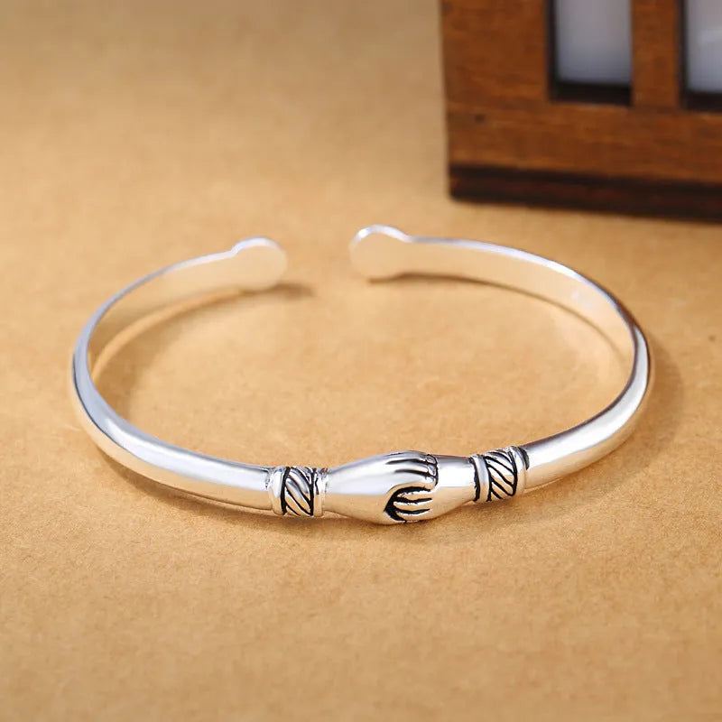 Retro copper handshake creative bracelet for women in silver metal finish