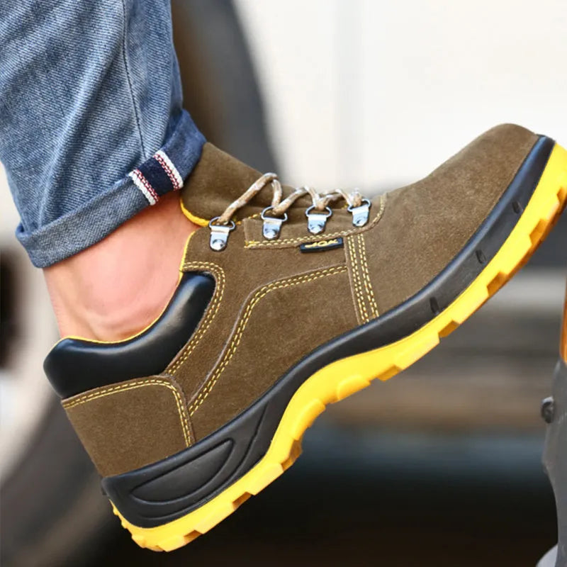 Bronze-coloured leather safety shoes with a steel toe cap and textured anti-slip sole.