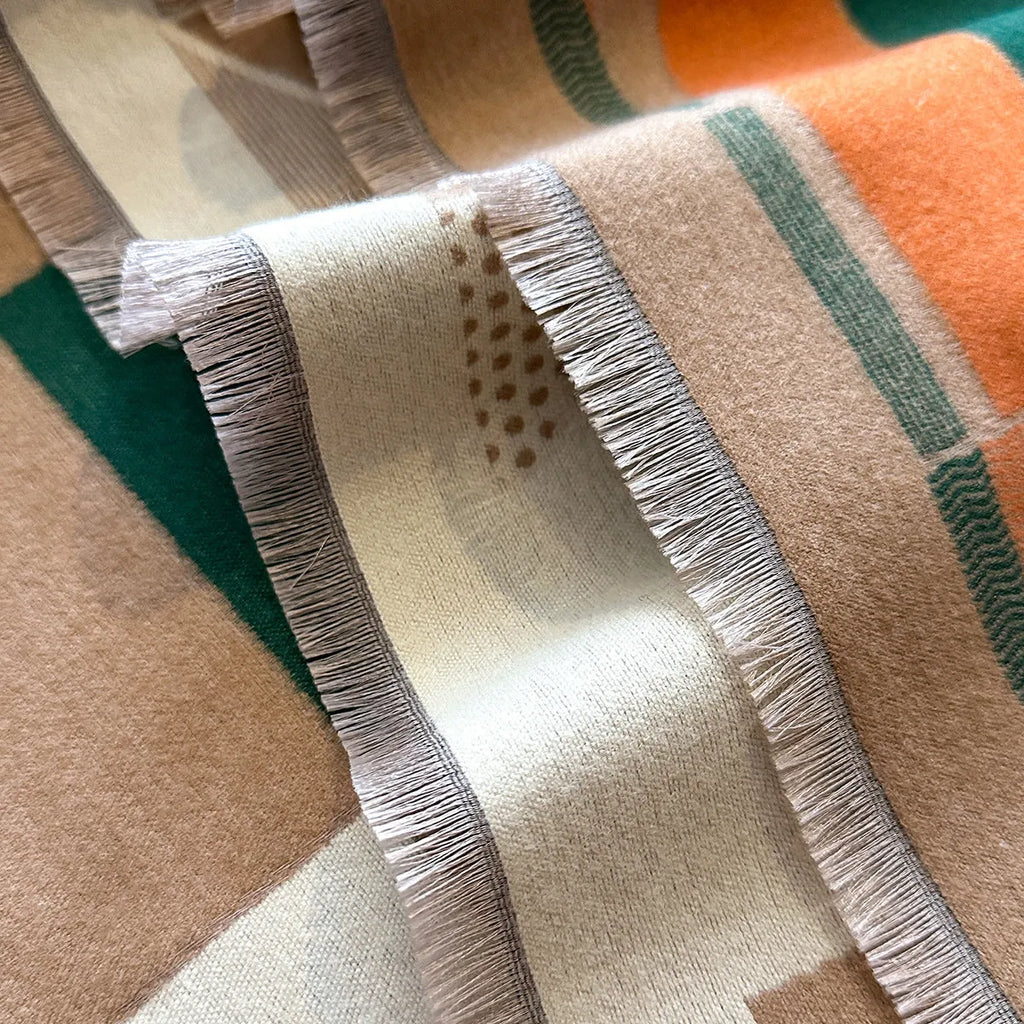 Long beige imitation cashmere scarf draped to show 185cm length and texture