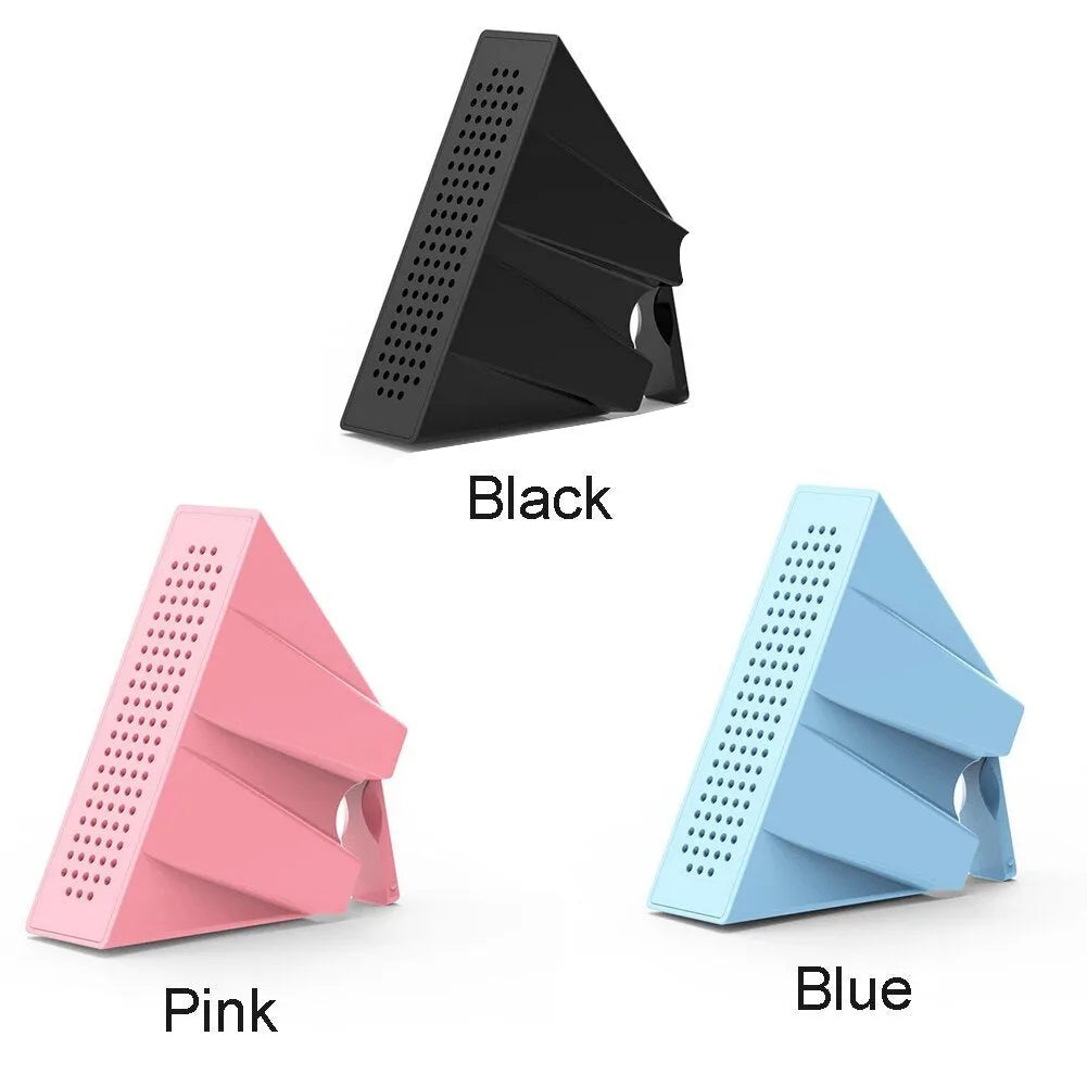 Portable iPhone speaker amplifier stand in ABS plastic showing phone in horizontal position