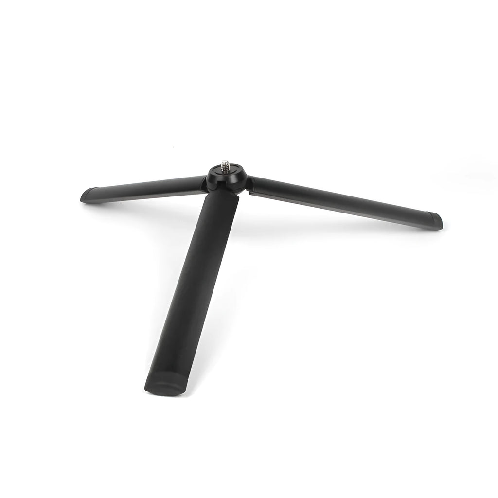 Black aluminium alloy mobile phone tripod and handheld stabiliser with telescopic legs extended.