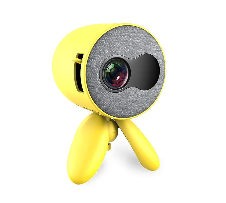 YG220 white or yellow LED projector displaying an image on a wall, showing front design and compact size.