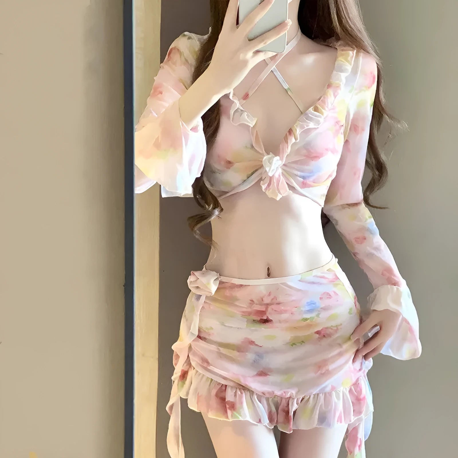 Women's floral bikini swimsuit in cherry blossom colours for beach and hot spring use