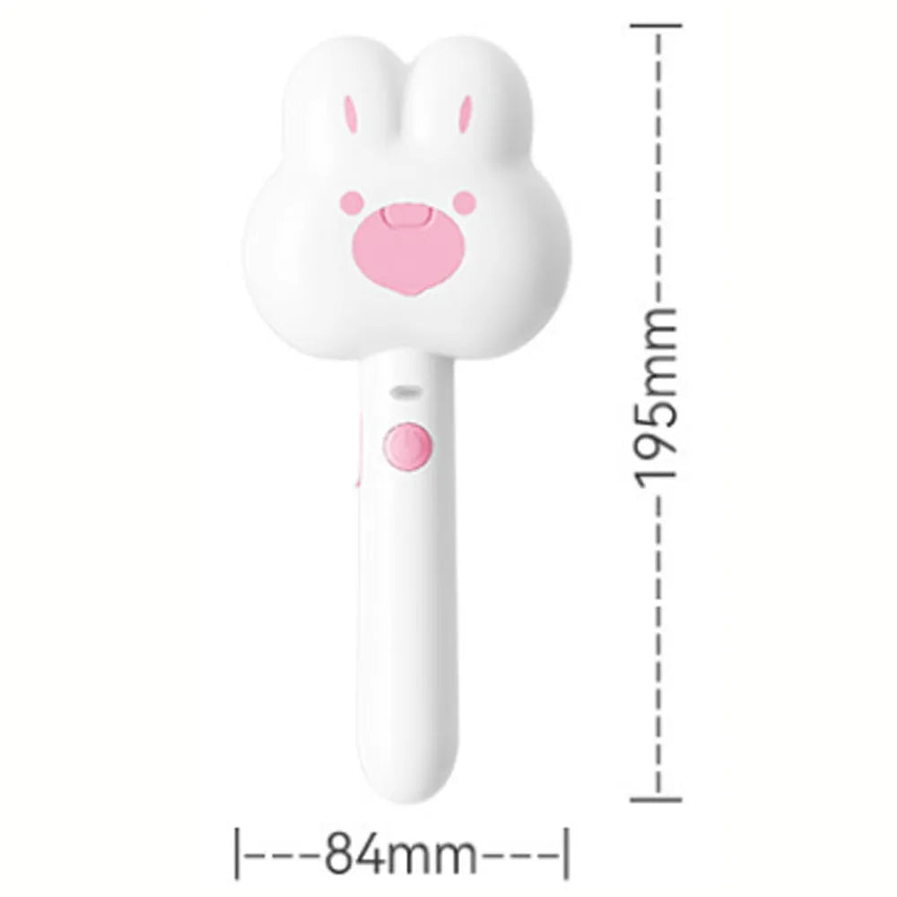 Cat steam brush grooming tool with cartoon design showing hot spray function and self-cleaning mode