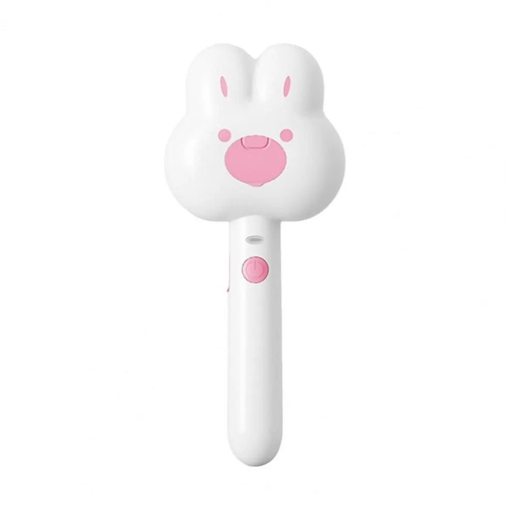 Cat steam brush grooming tool with cartoon design showing hot spray function and self-cleaning mode