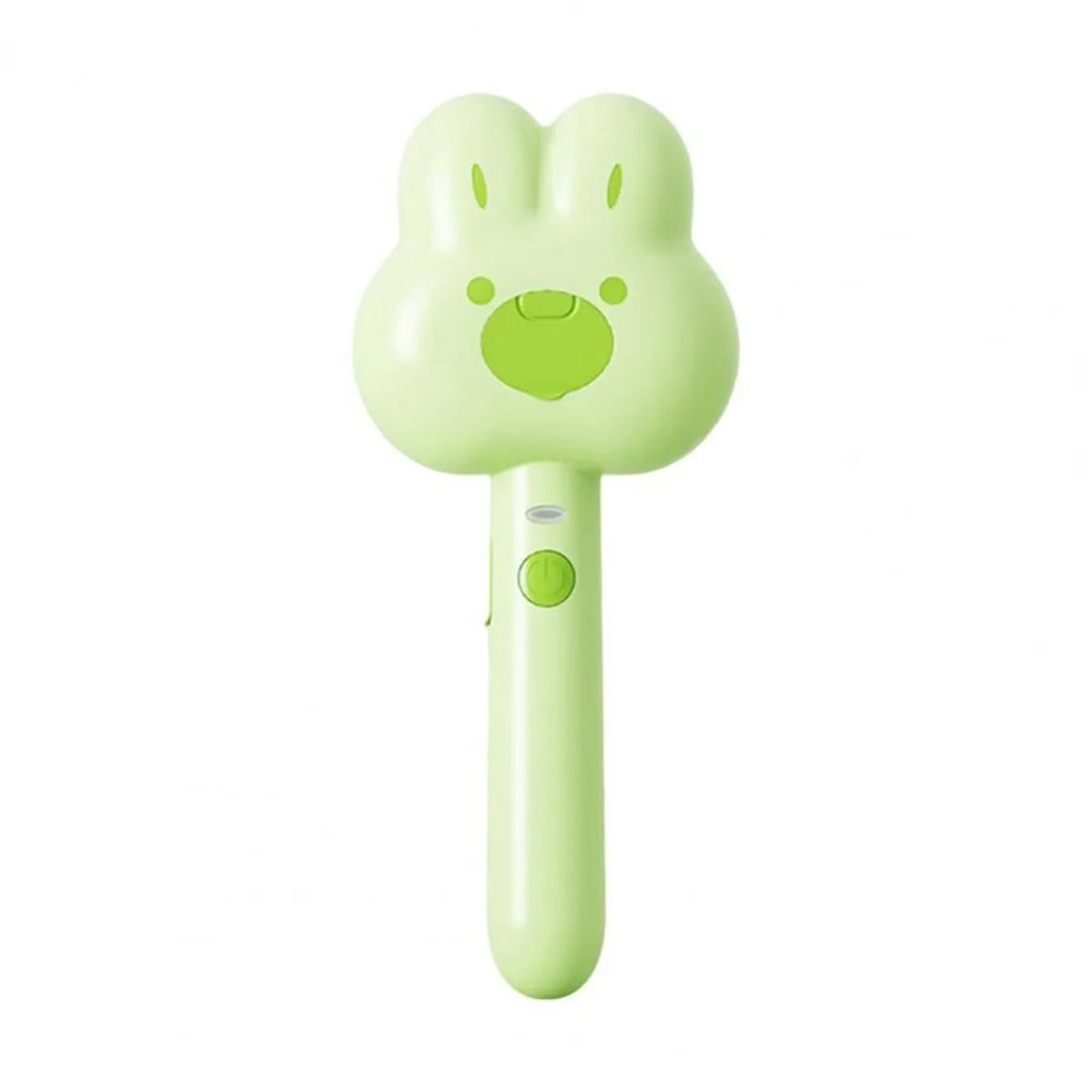 Cat steam brush grooming tool with cartoon design showing hot spray function and self-cleaning mode
