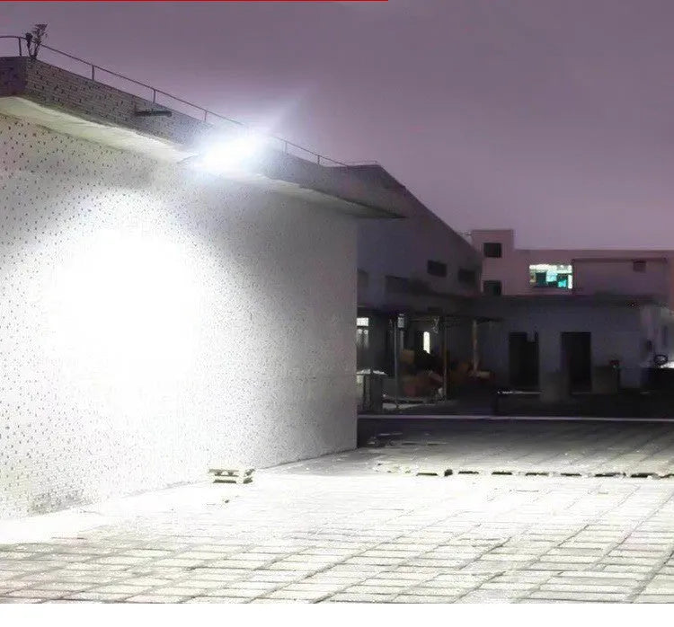 Black solar motion sensor street light for outdoor garden and pathway security lighting