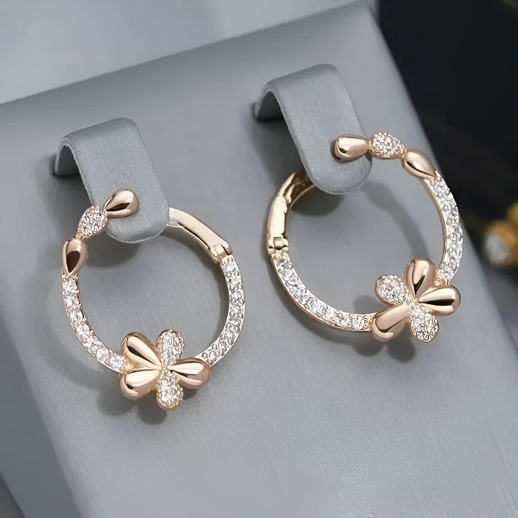 Copper geometric round ring earrings with electroplated finish, approximately 2.5 cm diameter