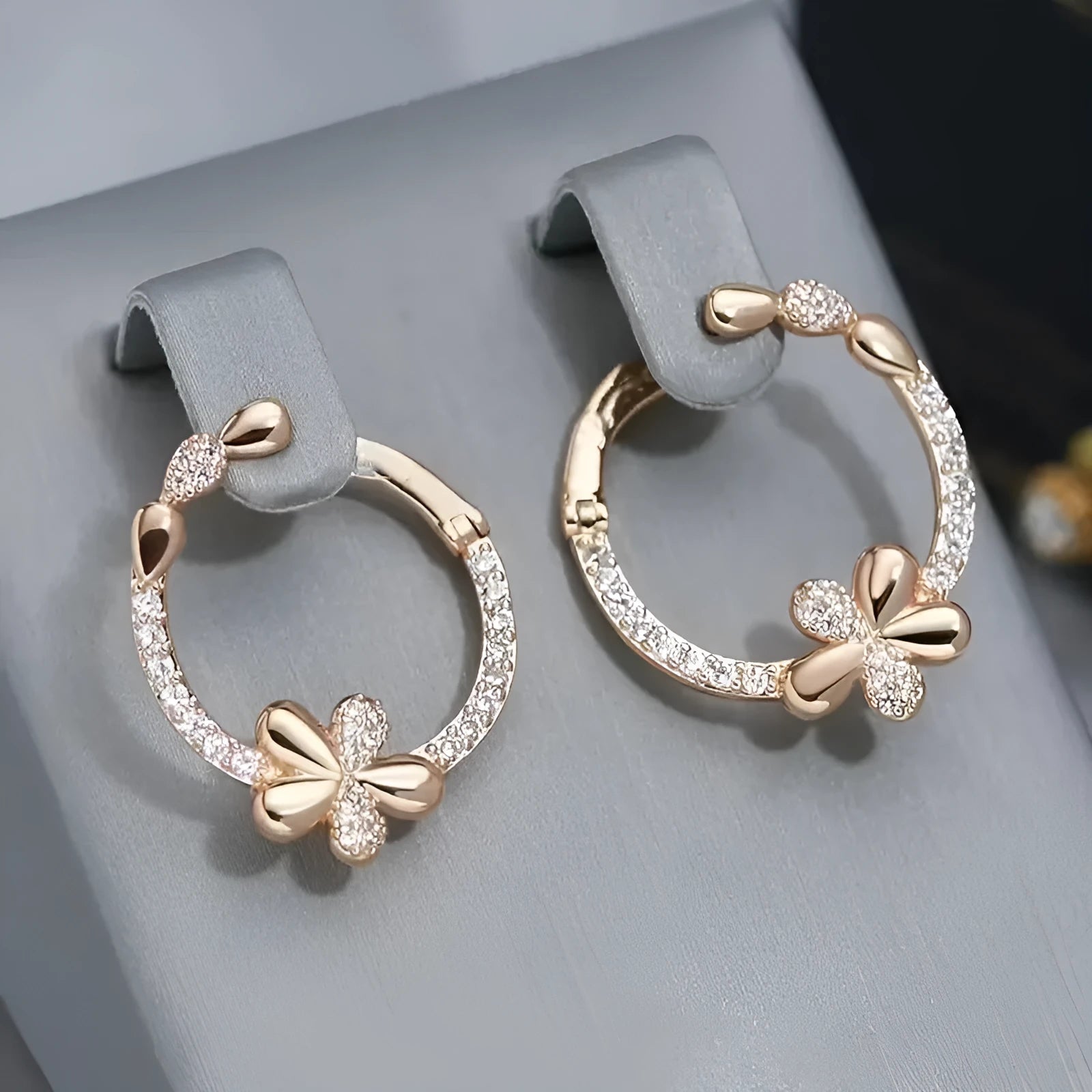 Copper geometric round ring earrings with electroplated finish, approximately 2.5 cm diameter