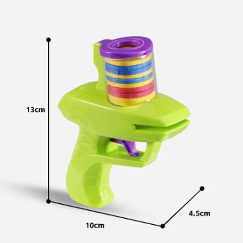 Interactive cat toy launcher in green or purple with foam discs for indoor play