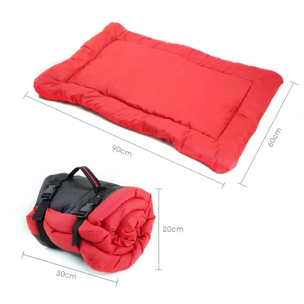 Blue foldable waterproof dog bed shown both open and secured with buckles for portable carry
