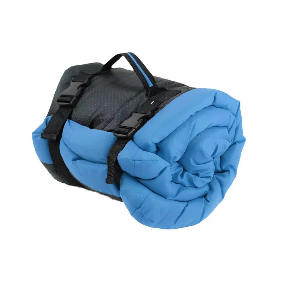 Blue foldable waterproof dog bed shown both open and secured with buckles for portable carry