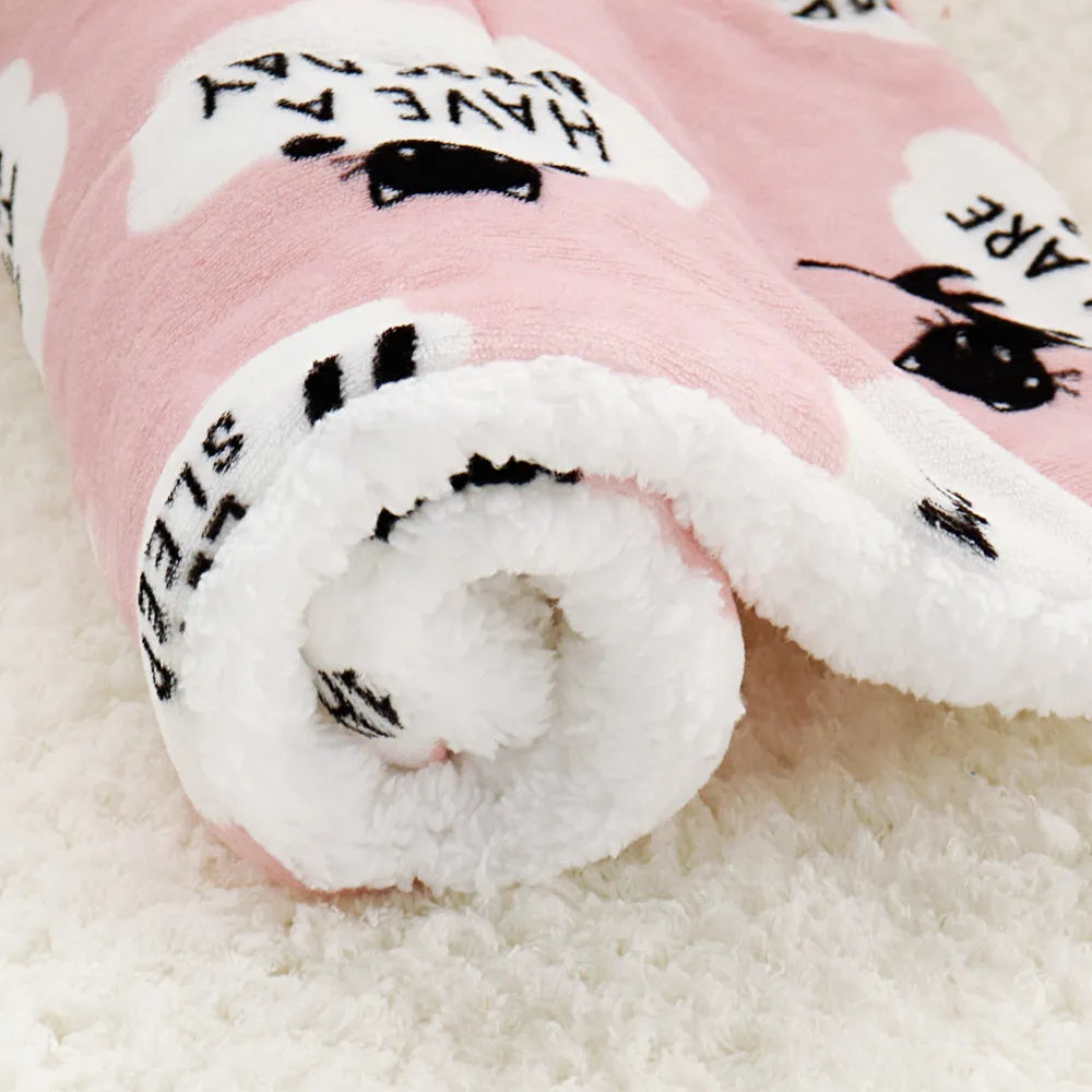 Pink lambskin pet blanket with cute cartoon design made from flannel and cashmere