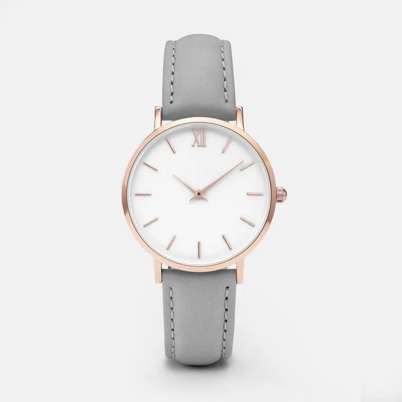 Square-faced quartz watch with PU leather strap on a wrist, showing the 35.5mm case.