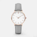 Square-faced quartz watch with PU leather strap on a wrist, showing the 35.5mm case.
