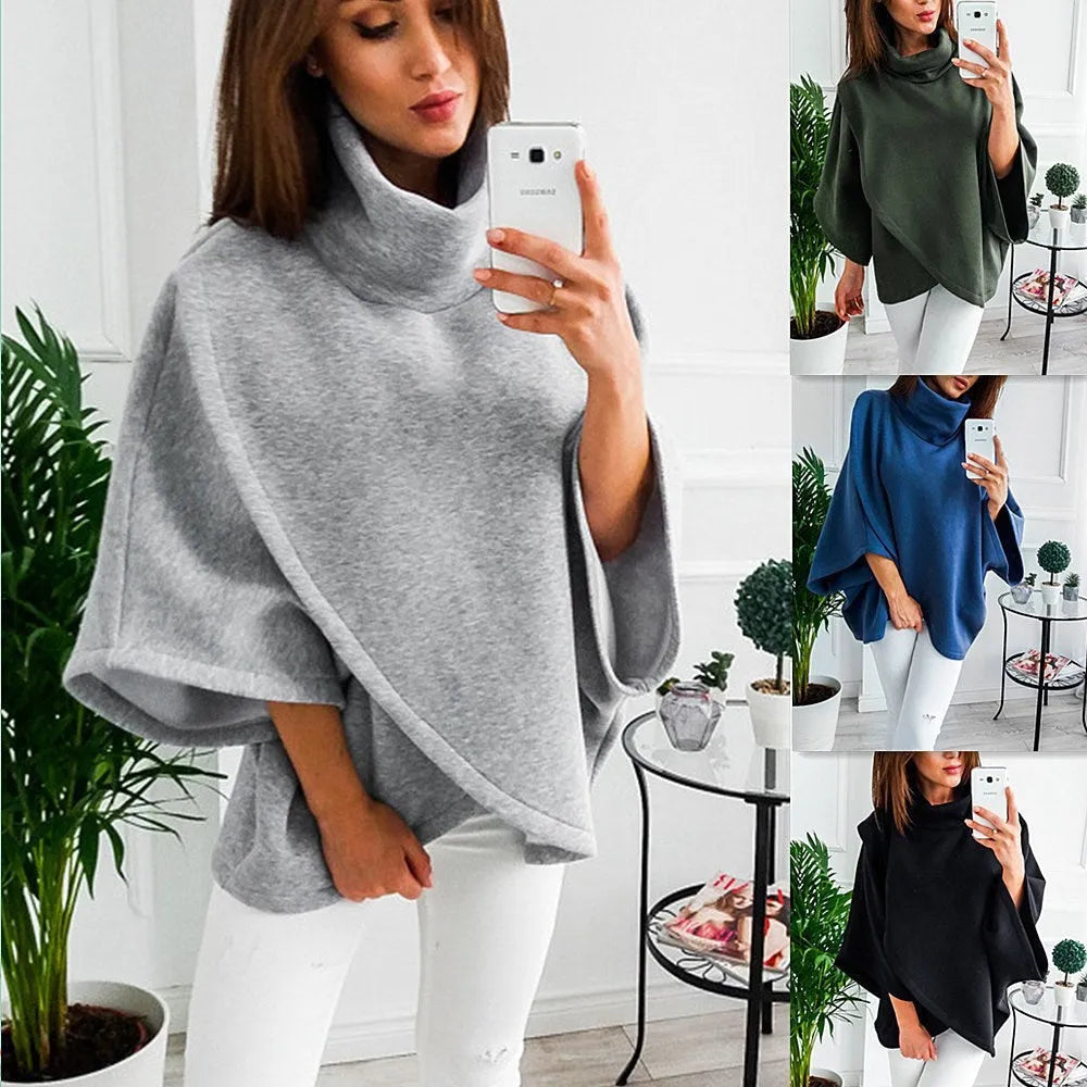 Women's long grey batwing sleeve cardigan sweatshirt with stitching detail and three buttons.