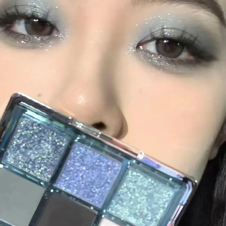Mugeleen nine-colour eyeshadow palette showing blue smoked shade with matte shimmer diamond finishes