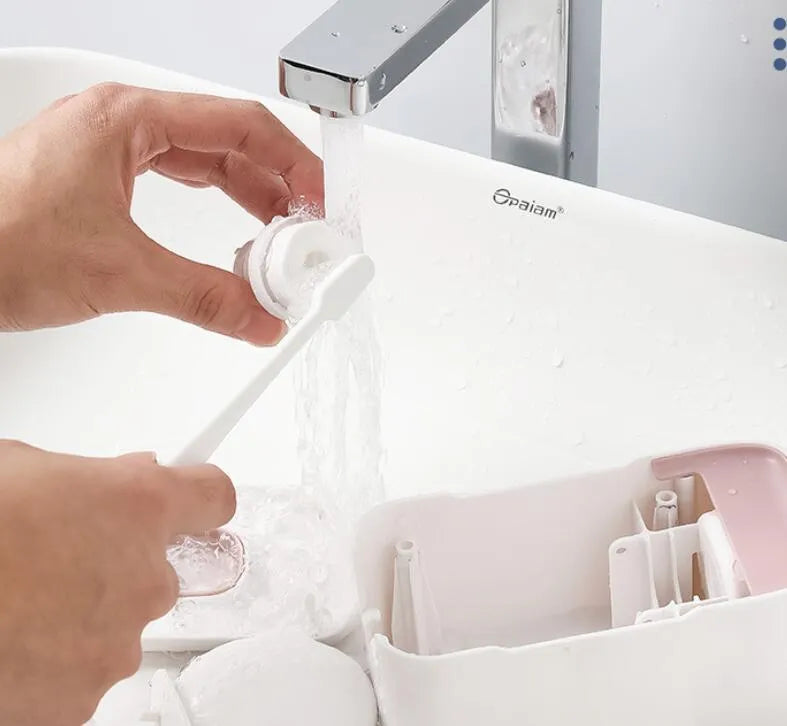 Automatic toothpaste dispenser in blue, grey or pink colours with sensor activation
