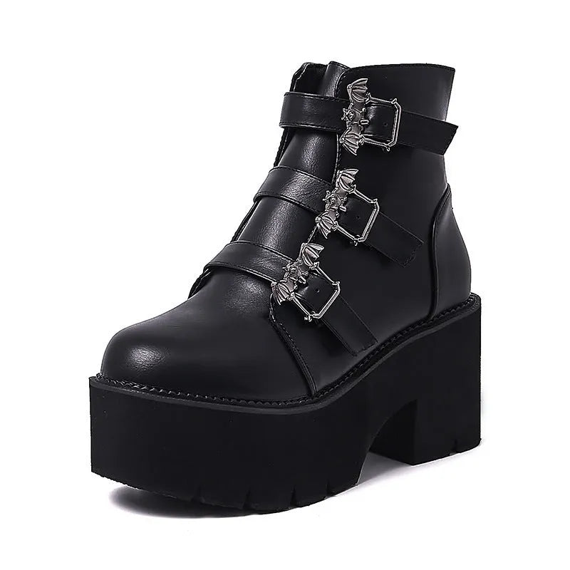 Women's black Harajuku punk ankle boots with bat buckle, side zip, and thick heel.