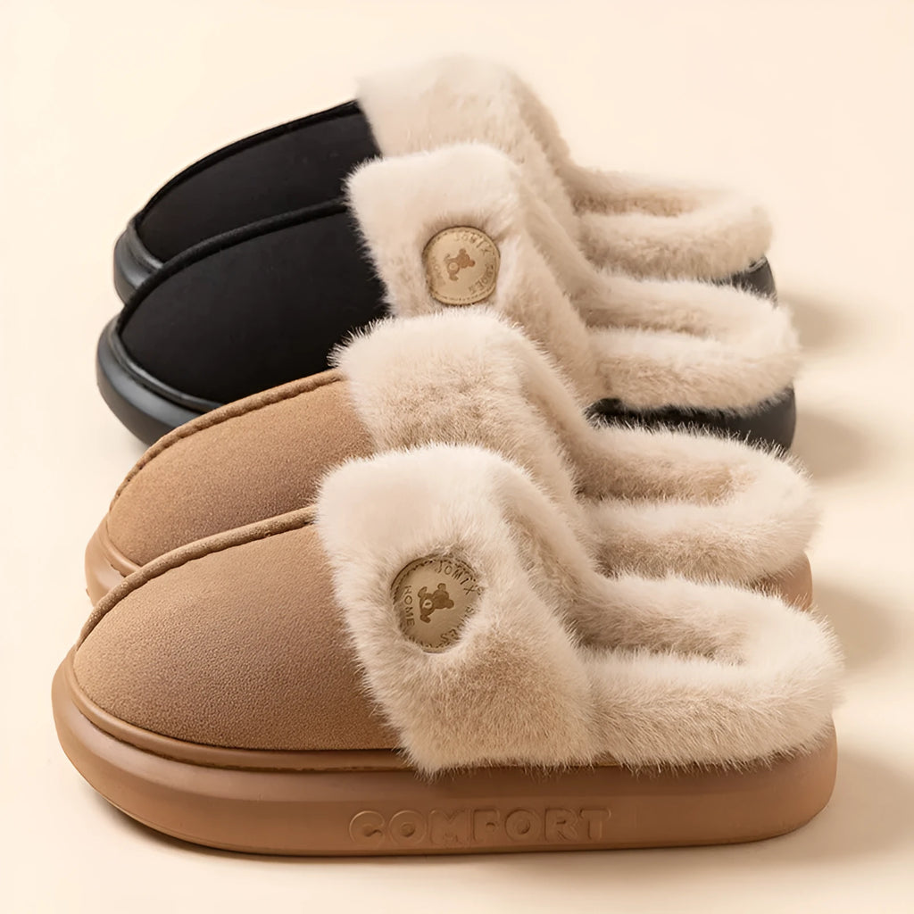 Plush fleece slippers with thick PVC soles in five colour options showing car stitching detail