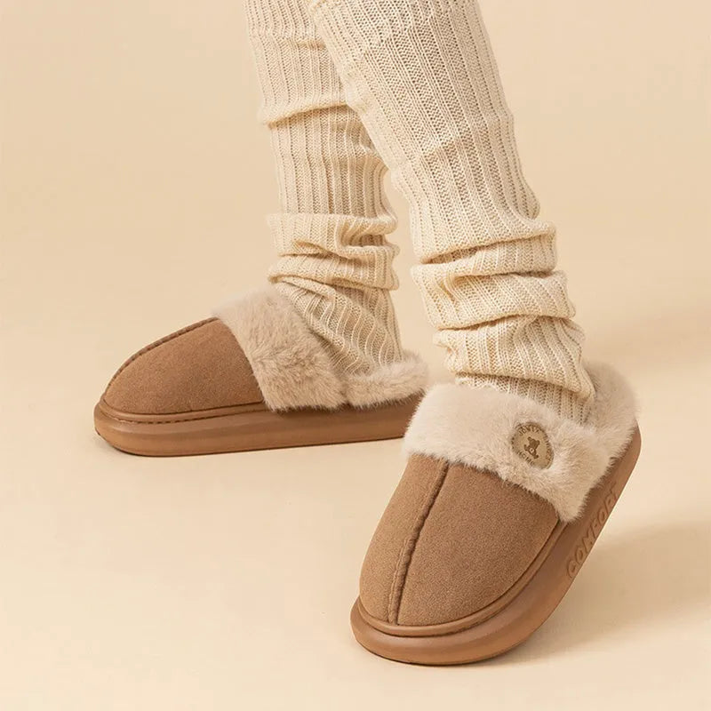 Plush fleece slippers with thick PVC soles in five colour options showing car stitching detail