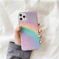 Rainbow gradient striped TPU protective case for iPhone on wooden surface