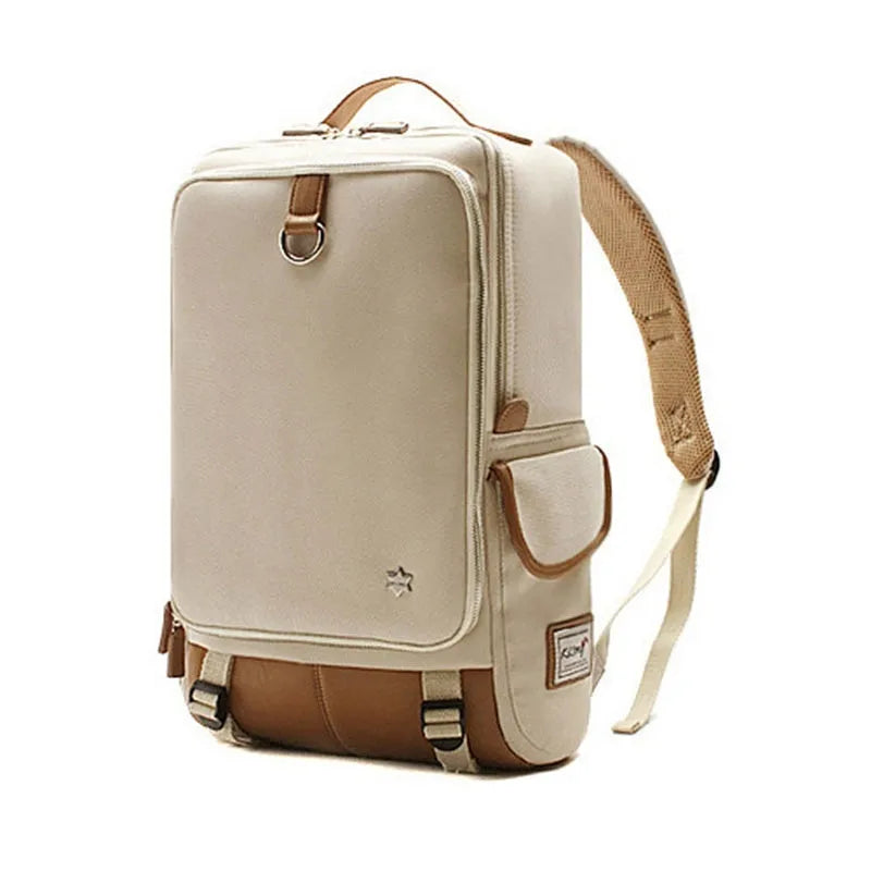 Large grey Korean-style backpack made of Oxford cloth, shown next to a laptop for scale.