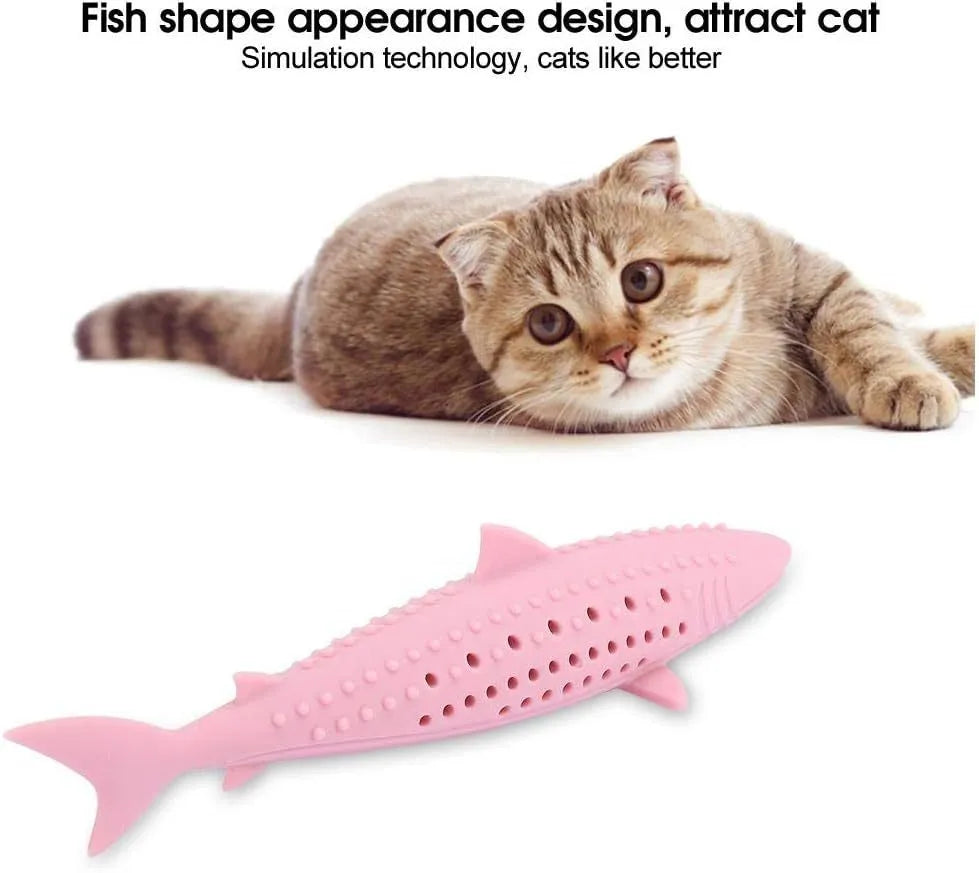 Green silicone dolphin-shaped cat chew toy on a white background, showing side air holes.