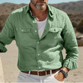 Men's long-sleeved casual shirt in a solid colour, shown in a loose fit made from cotton and linen fabric.