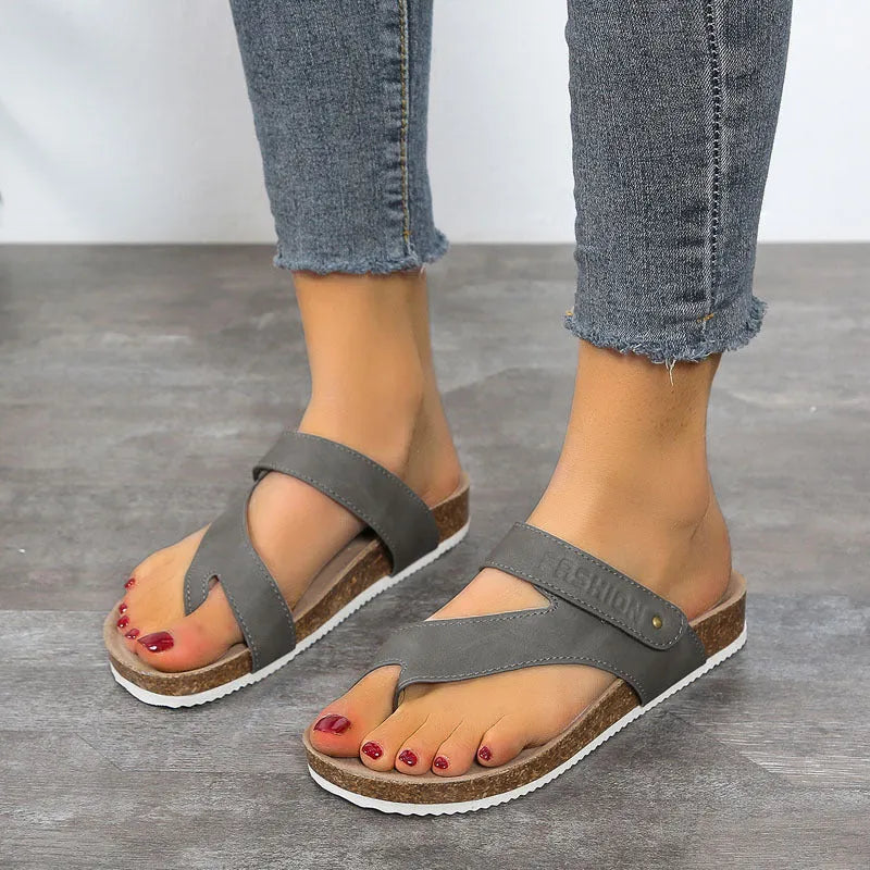 Flat toe ring thick-soled flip-flops in a solid colour with a foam sole.