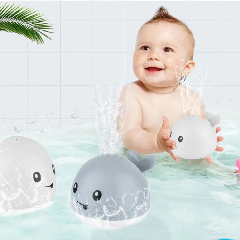 Automatic water spray whale bath toy with lights floating in baby bath
