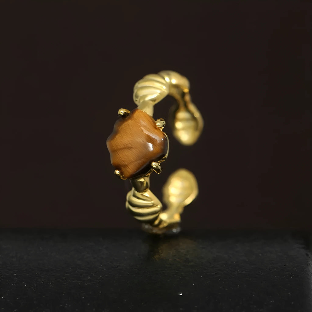 Women's adjustable silver ring with natural shell and tiger eye stone in cold-style design