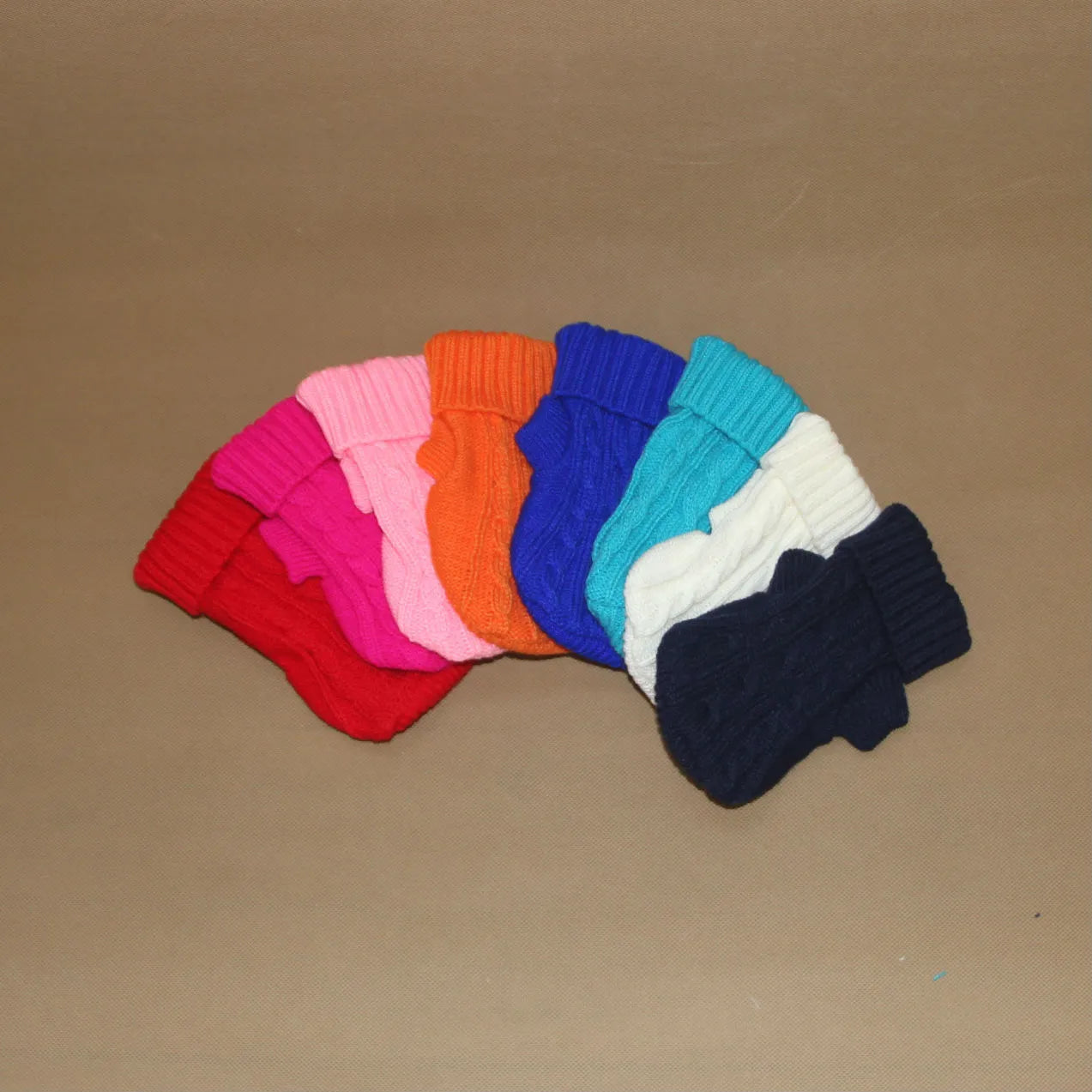 Knitted wool dog sweater in eight colours with fabric buttons for small to large dogs