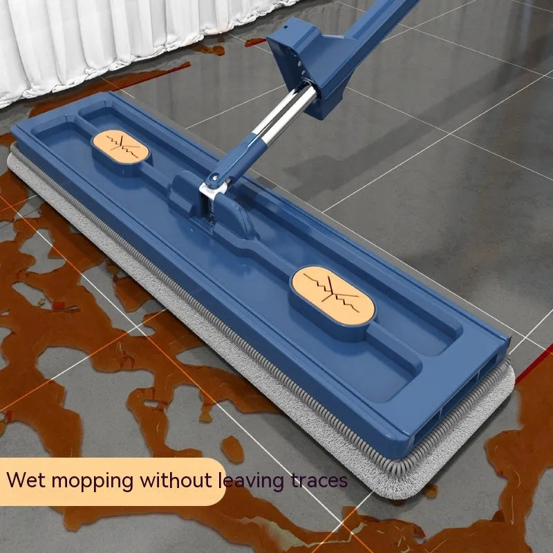 Large flat mop with blue cloth and long stainless steel handle showing 360-degree rotating head.