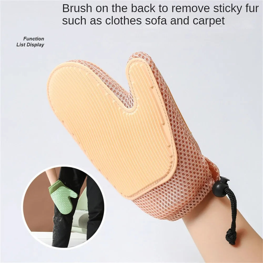 Dark blue mesh pet grooming glove for removing hair from dogs and cats